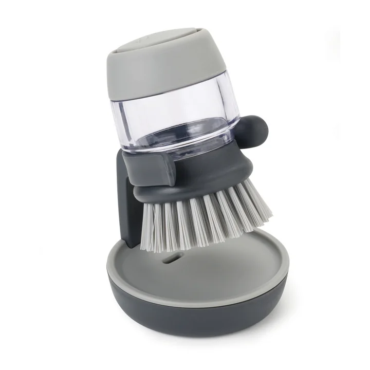 Palm Scrub Brosse pour évier avec distributeur de détergent de Joseph Joseph en gris