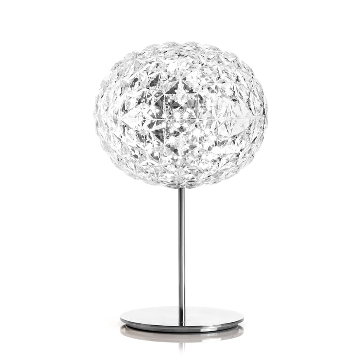 La lampe de table à LED Planet dimmable avec pied de Kartell en transparent