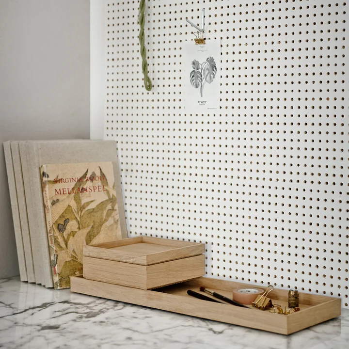 Le site Nomad Box de Skagerak sur une surface en marbre