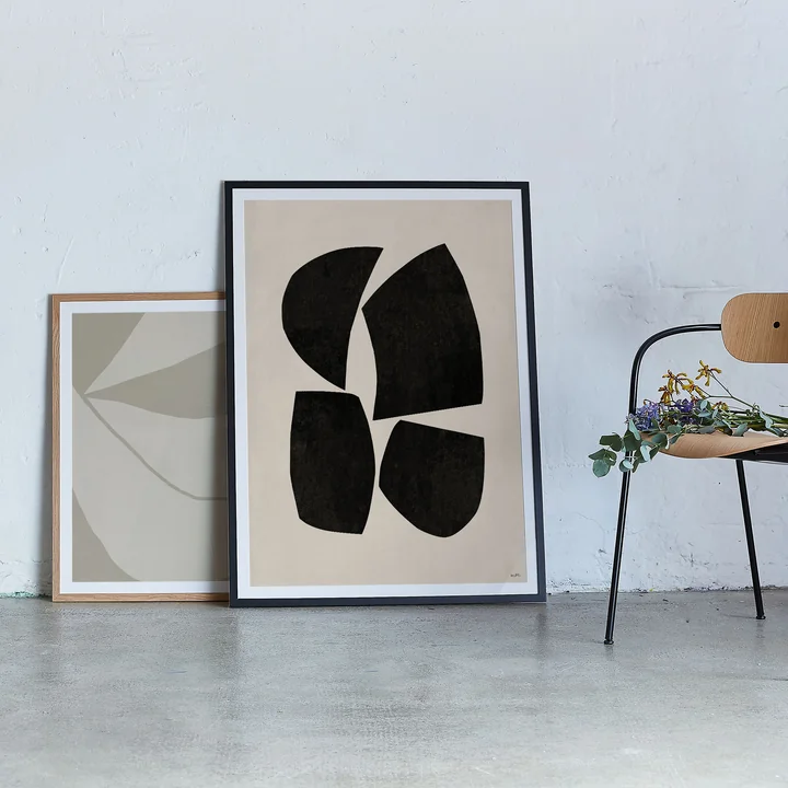 des affiches fusionnées avec art dans des cadres assortis