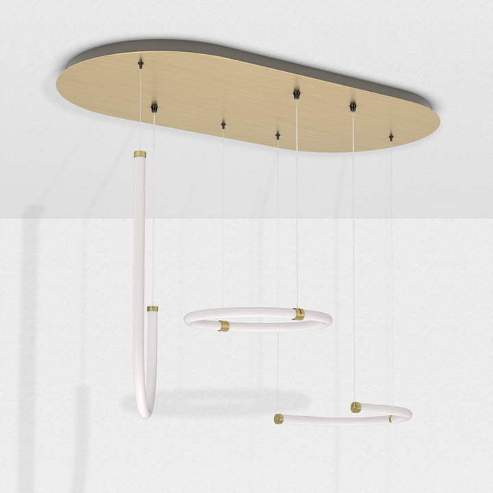 Le luminaire suspendu Unseen de Petite Friture en laiton apporte un nouveau niveau de style à la lumière néon