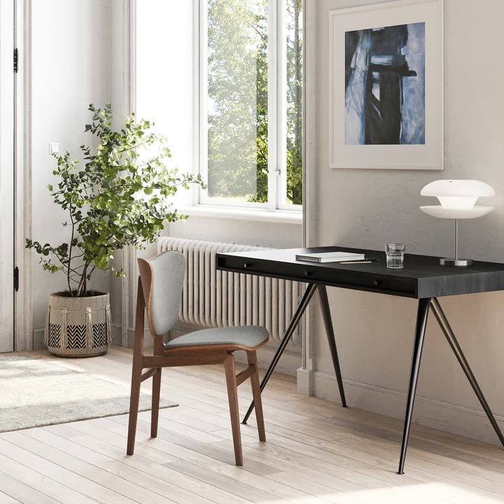 Le bureau JFK de Norr11 au mur dans le bureau