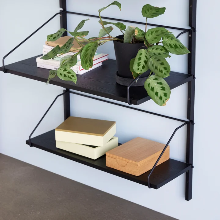 Boîte de rangement chic sur l'étagère